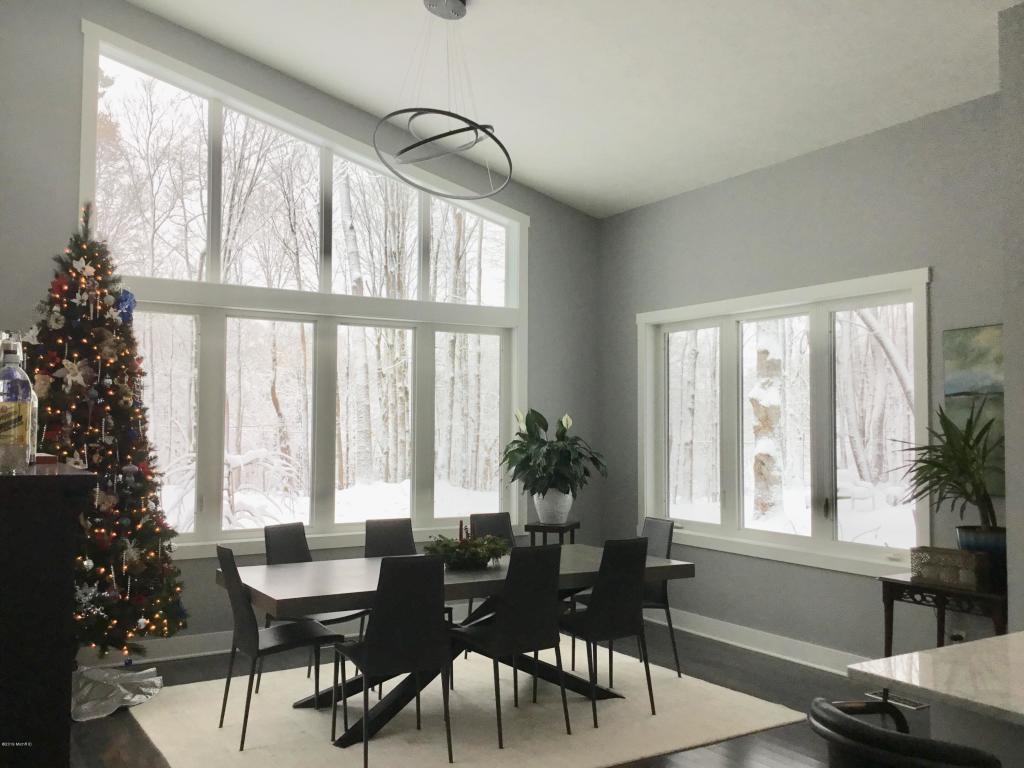 Modern dining space with vaulted ceiling